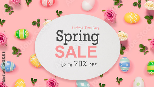 Spring sale message with Easter eggs on a pink background