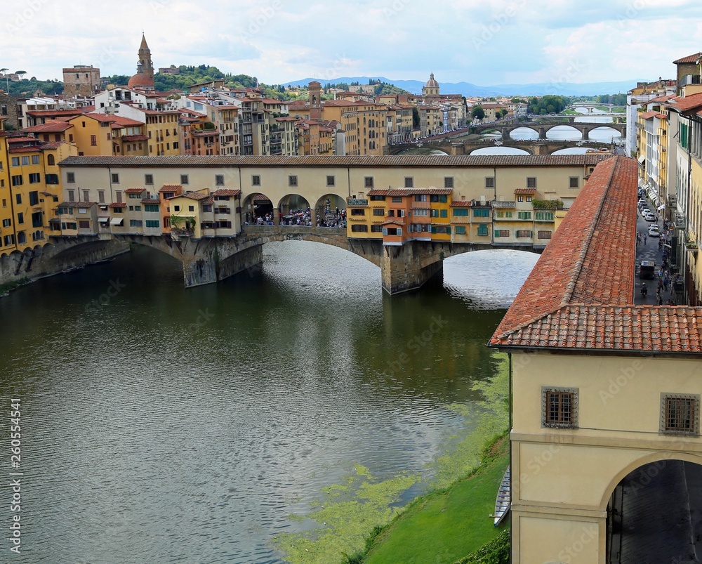Fototapeta Old bridge called Ponte Vecchio and Vasari Corridor in Florence