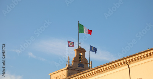 big Italian Flag and other two on the Quirinale Palace in Rome h photo