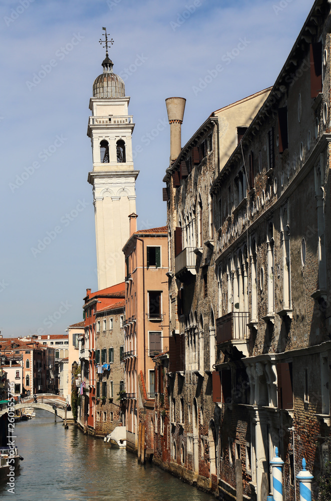 Canal and church tower in Venice, Italy