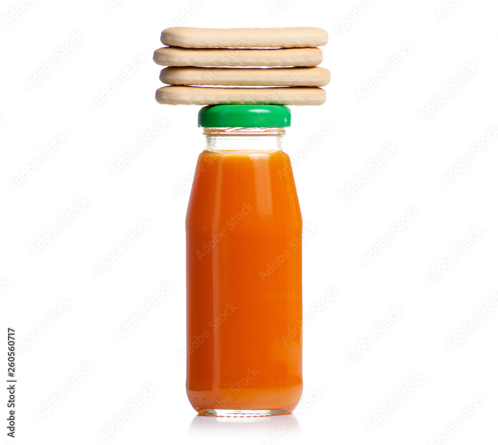 Children carrot juice and cookies on a white background. Isolation Children carrot juice and cookies on a white background. Isolation