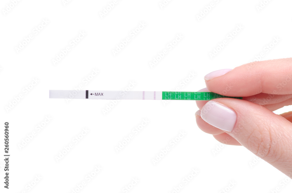 Ovulation tests positive in hand on a white background. Isolation Ovulation tests positive in hand on a white background. Isolation