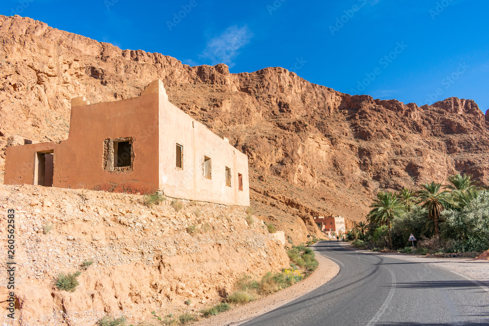 Road at Todra Gorge in Morocco with a Building