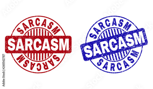 Grunge SARCASM round stamp seals isolated on a white background. Round seals with grunge texture in red and blue colors. Vector rubber imprint of SARCASM tag inside circle form with stripes.