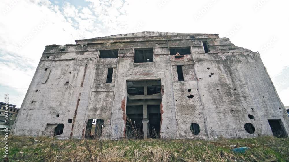 Abandoned industrial building. Ruins of an old factory. Abandoned industrial building. Ruins of an old factory.
