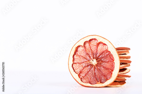 Dried grapefruits on white background