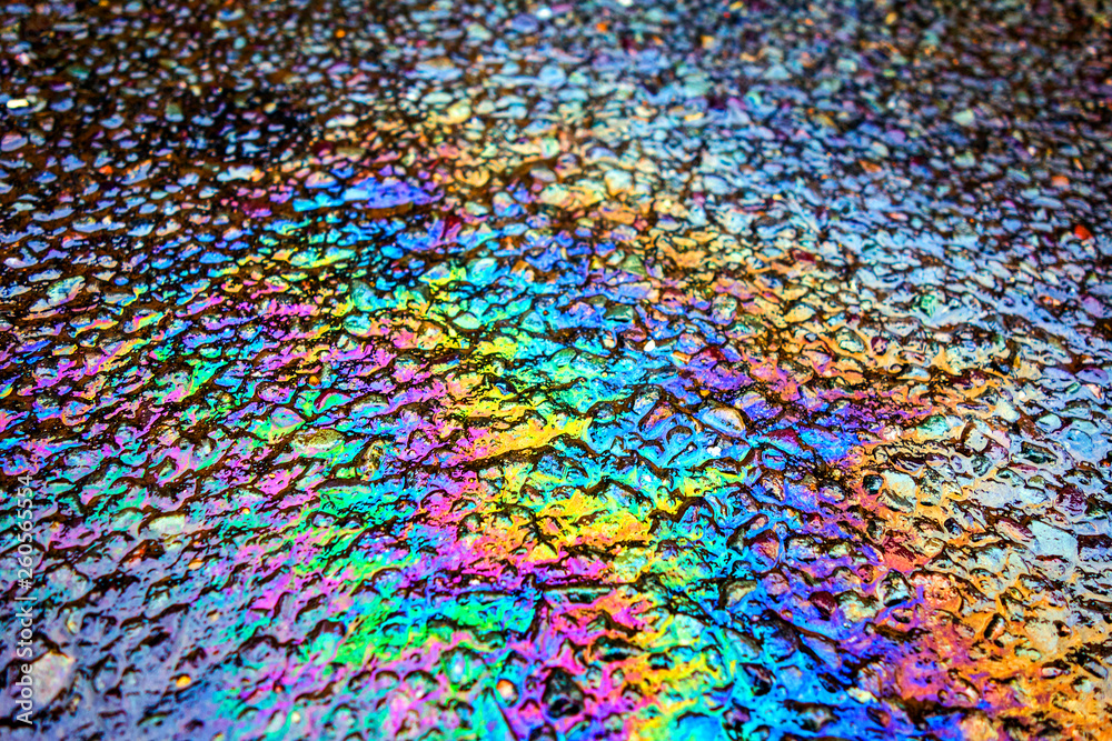 Oil Petrol Pollution Rainbow Spill on A Road
