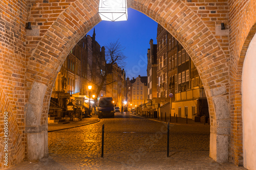 Beautiful gate to the old town of Gdansk at night, Poland.