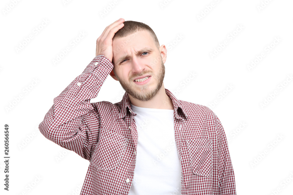 Young man having headache on white background Young man having headache on white background