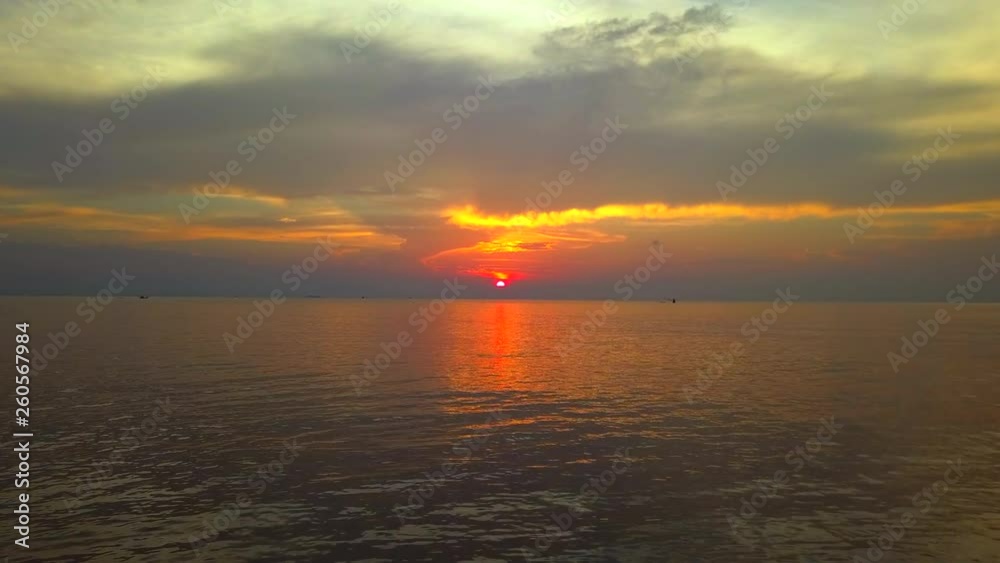 Sunset on the sea, fly cam slowly approaching forward and up Sunset on the sea, fly cam slowly approaching forward and up