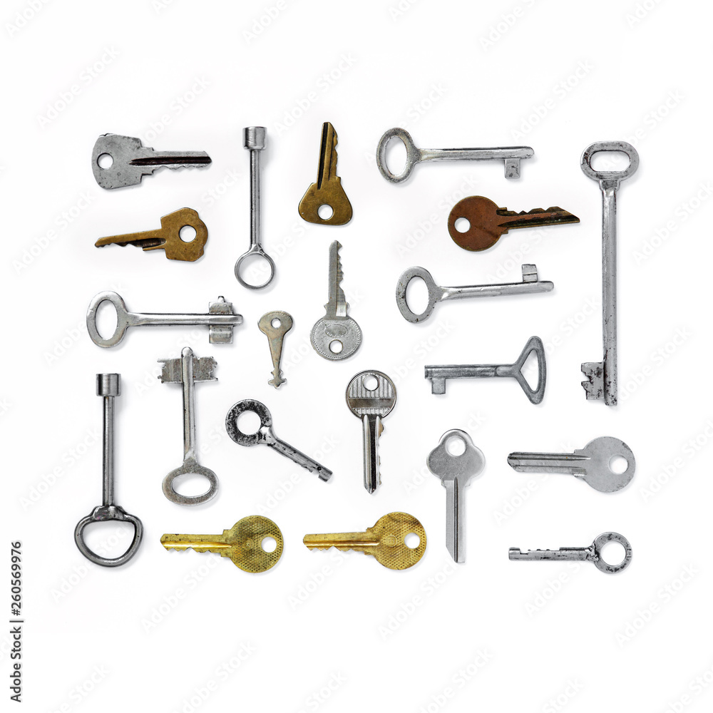 The figure is a rectangle of old keys on white isolated background. Old keys. The figure is a rectangle of old keys on white isolated background. Old keys.