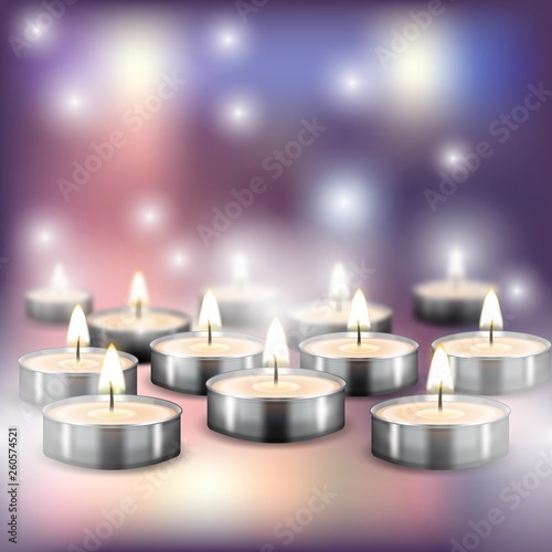 Lighted holiday candles on blurred background