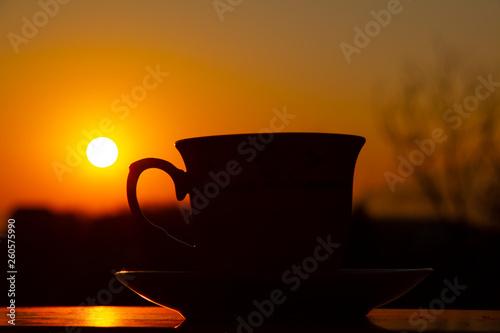 Silhouettes of sunrise morning coffee