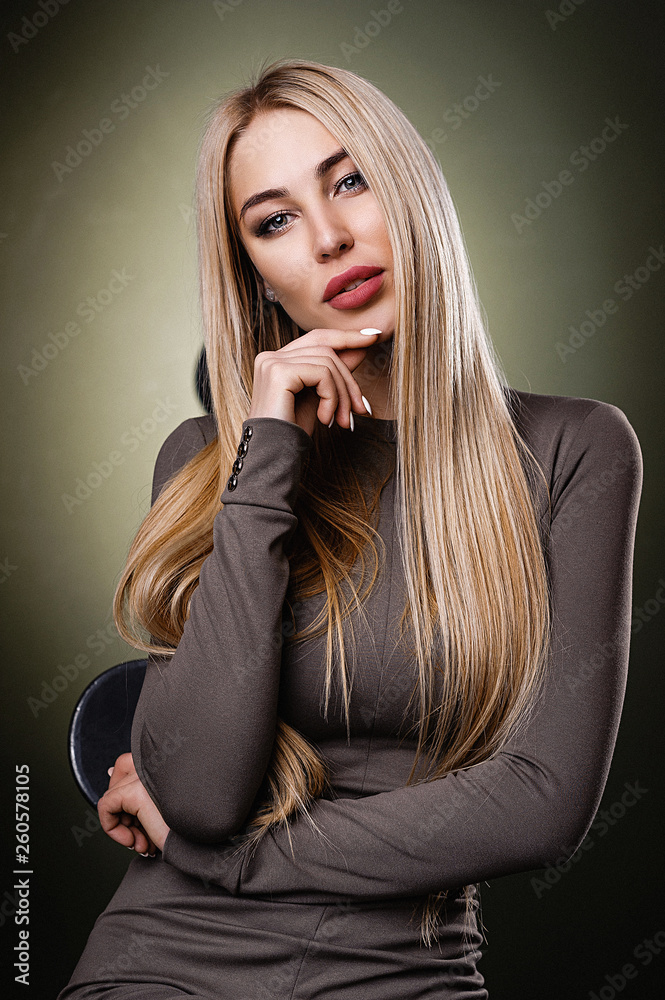 Fototapeta premium Blonde in a business suit. Portrait