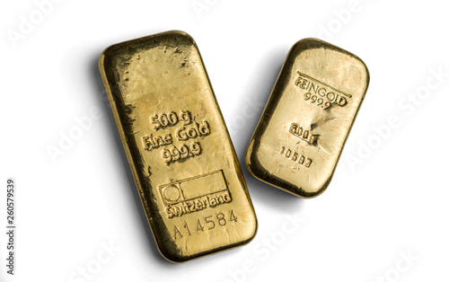 Two gold bars weighing 500 grams each isolated on a white background. Swiss and German gold bars. feingold is fine gold.