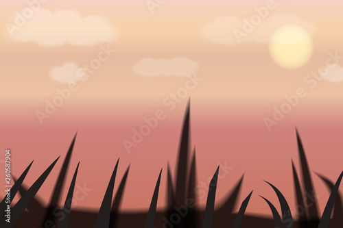 Landscape of sunset and grass silhouette.