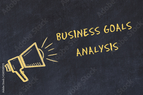 Chalk board sketch with handwritten text business goals analysis photo