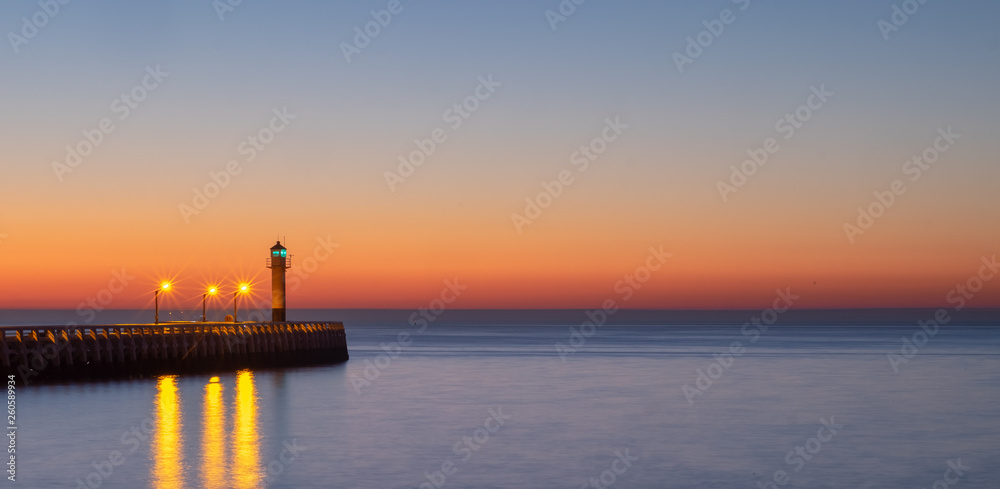 Long exposure image of the Nieuwpoort lighthouse at sunset