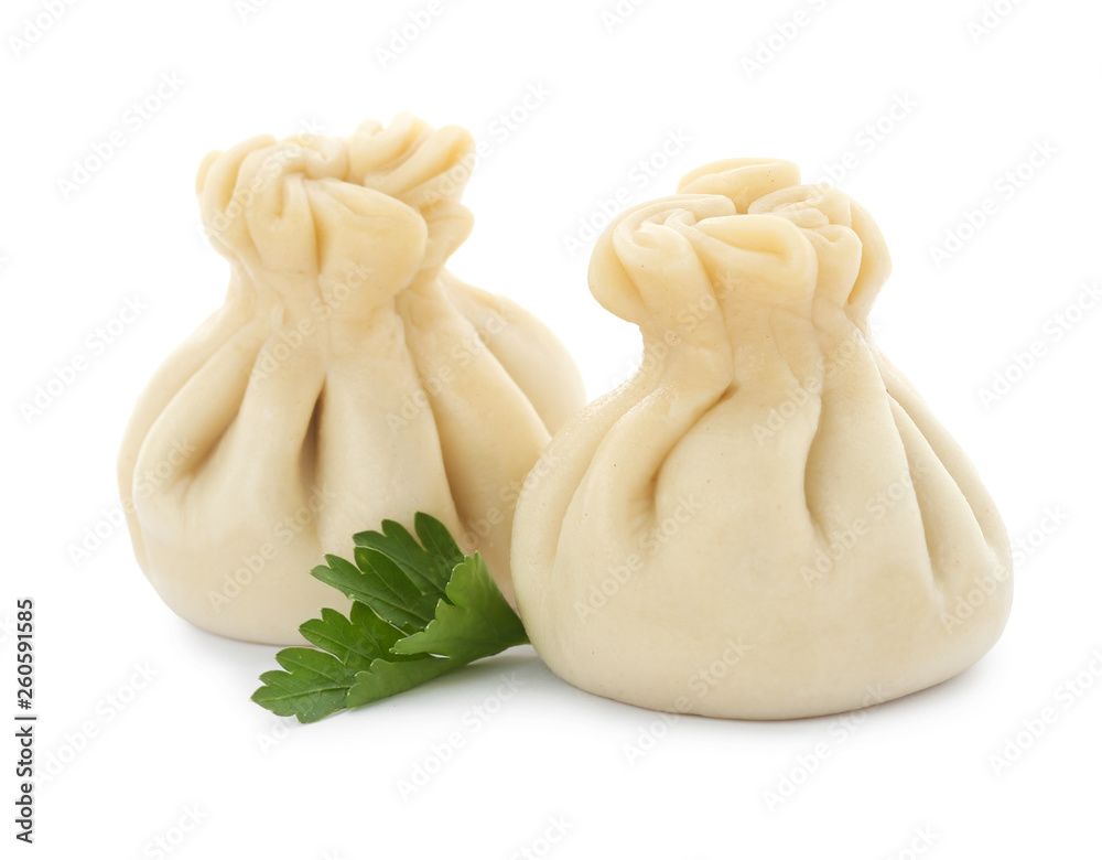 Fototapeta premium Boiled dumplings with tasty filling on white background