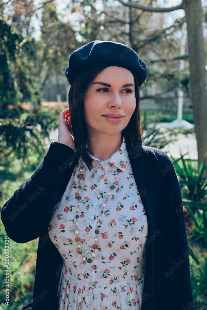 girl enjoys good weather walking in the park girl enjoys good weather walking in the park