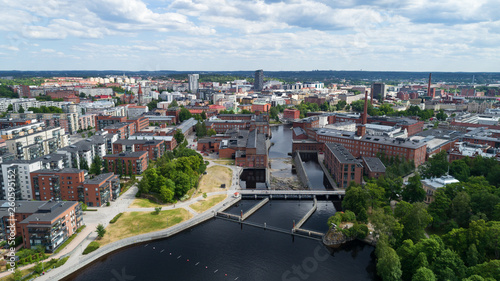 Beautiful panorama of the Tampere city at sunny summer day. Blue sky and beautiful clouds.