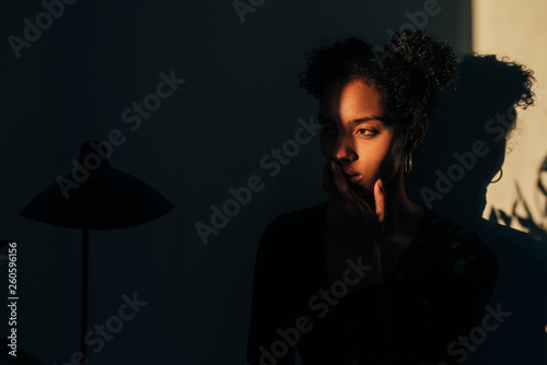 Photography Woman standing near plant with shadow light