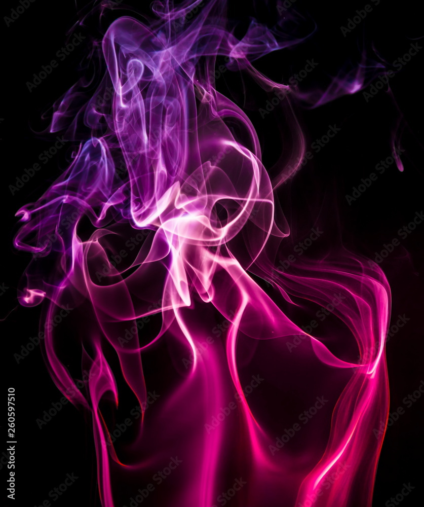 Colored smoke on black background