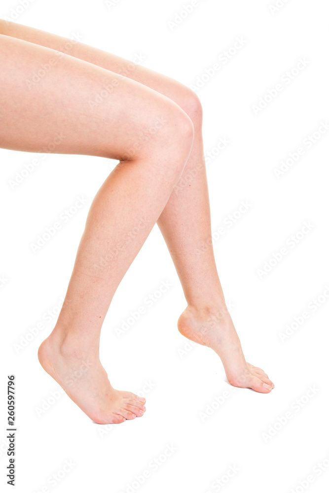 Long pretty woman legs isolated on background Long pretty woman legs isolated on background