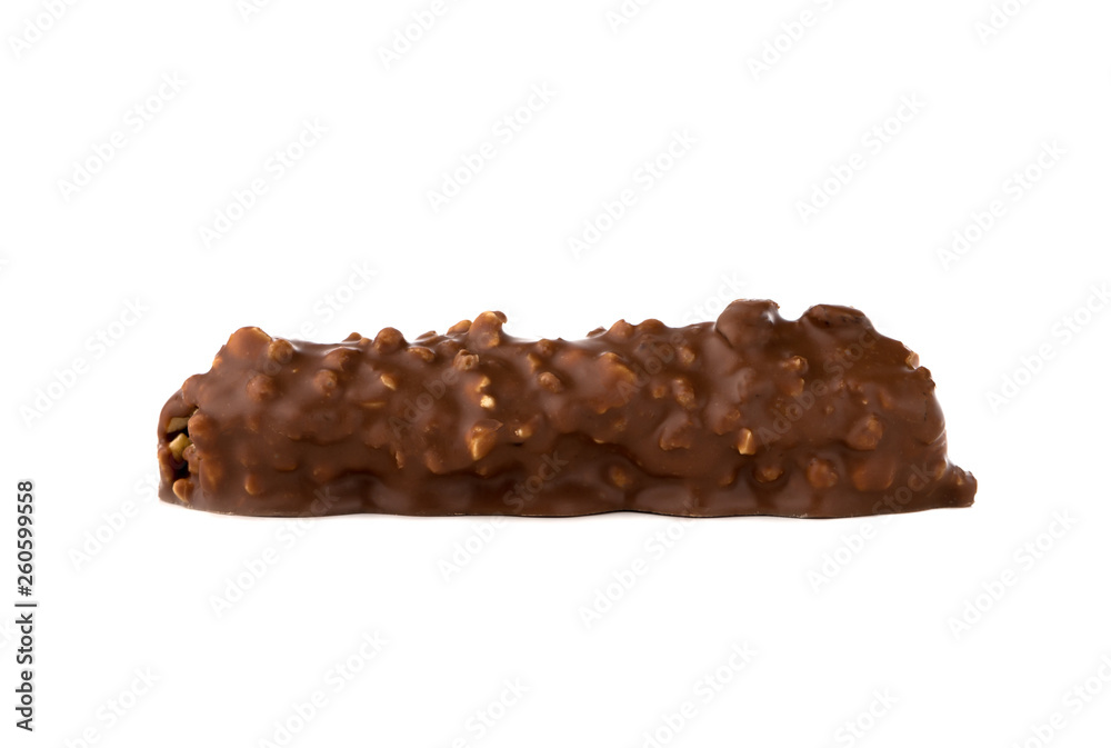 Chocolate bar on a white background. Candy with peanuts and raisins, caramel, puffed rice waffles, in chocolate isolated on white background. Chocolate bar on a white background. Candy with peanuts and raisins, caramel, puffed rice waffles, in chocolate isolated on white background.