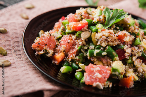 healthy salad with quinoa, vegetables and grapefruit