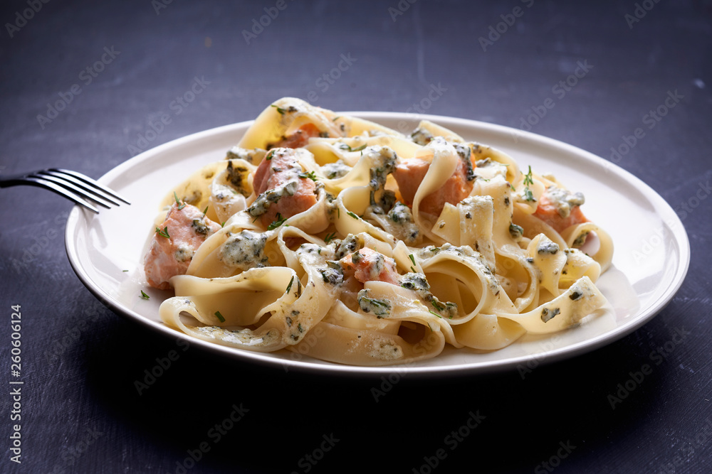plate of fettuccine with salmon plate of fettuccine with salmon