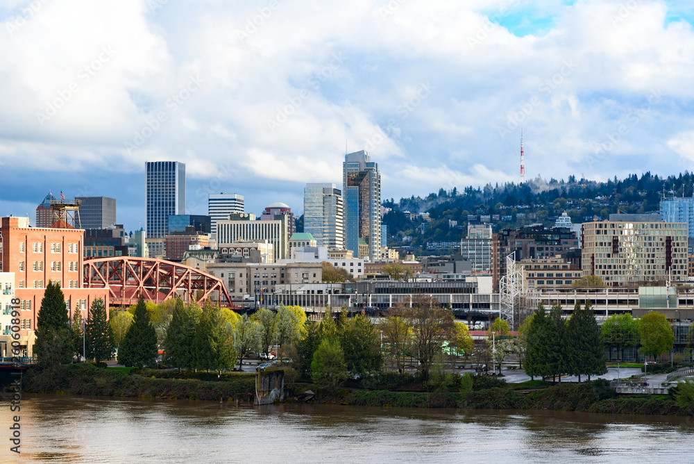 Day view of Portland, Oregon downtown from Willamette river bank