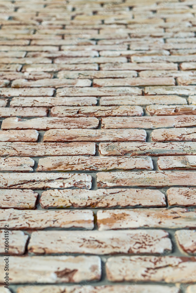 Obraz premium red brick wall texture grunge background with vignetted corners, may use to interior design