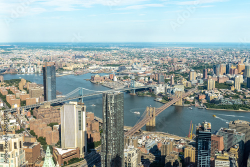 Manhattan aerial View with its bridges, Brooklyn Bridge and Manhattan Bridge © dade72