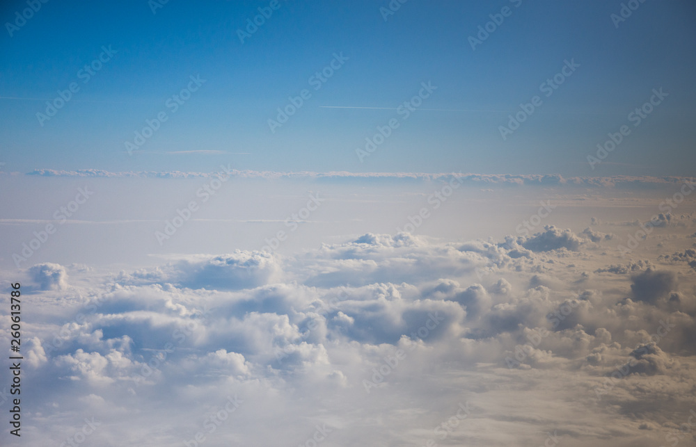 Naklejka premium View from the airplane to the sky . Blue sky with clouds