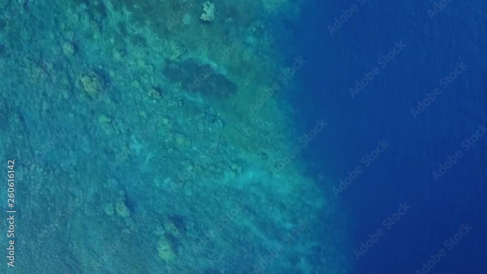 Drone descending into Tropical Waters in Papua New Guinea Drone descending into Tropical Waters in Papua New Guinea
