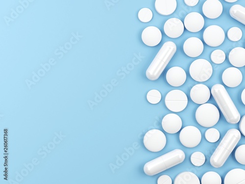 White pills isolated on blue background. 3d illustration.