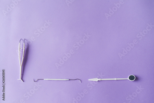 Dental instruments on colorful background with copy space photo