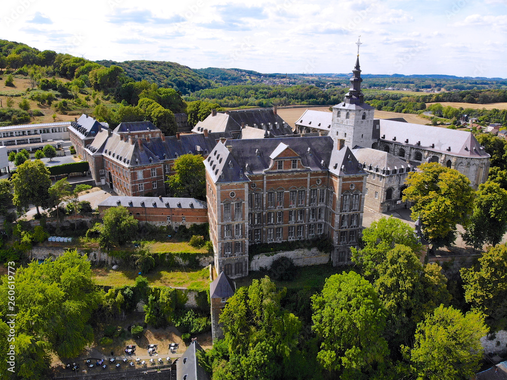 Aerial view of Floreffe Abbey during summer day, Belgium. Old abbey where they produced famous Floreffe beer. Top view green valley with beautiful abbey.