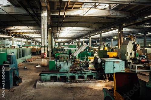 Old metalworking factory production line. Rusty machine tools