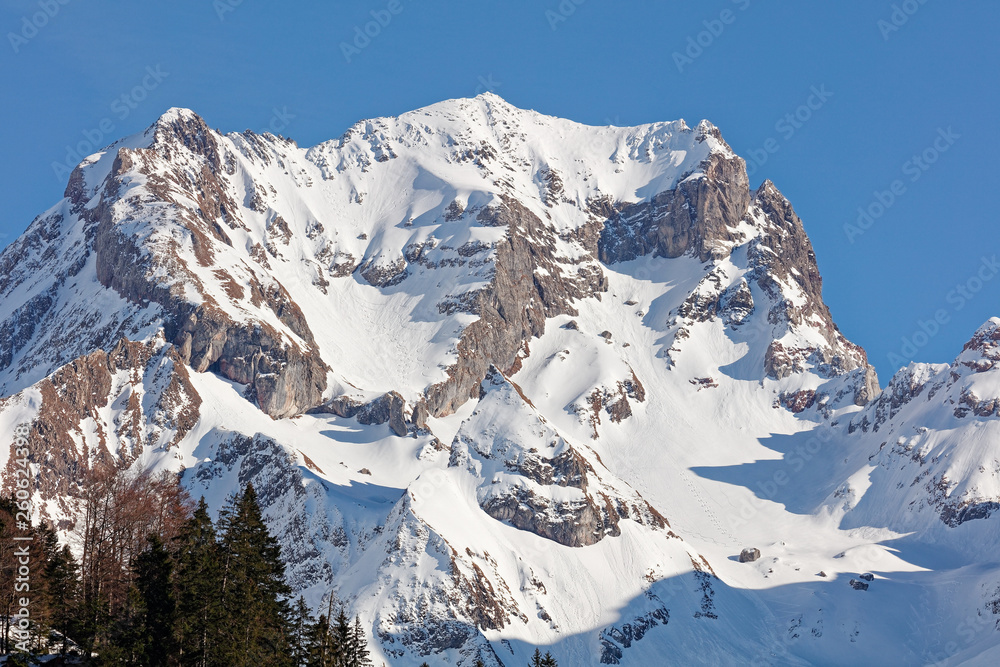 View of snowy Rote Wand with ski tracks