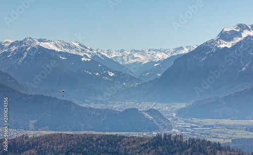 Paraglider flying over Rhine valley