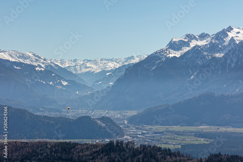 Paraglider flying over Rhine valley