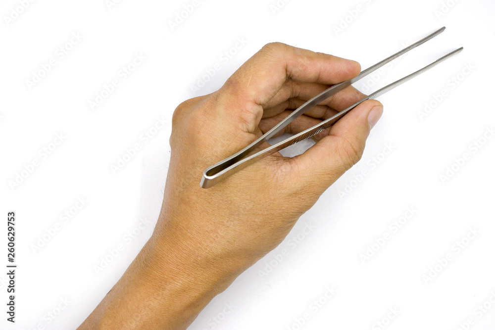 A male hand holding Tweezers, medical pinsetter, man hand isolated on white background A male hand holding Tweezers, medical pinsetter, man hand isolated on white background