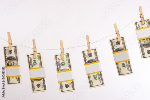 Money is dried on a rope. S...
