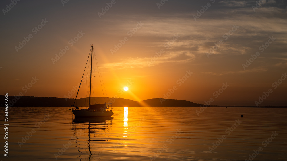 Sunrise Boat on the Lake