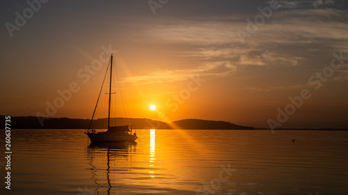 Sunrise Boat on the Lake © Mick