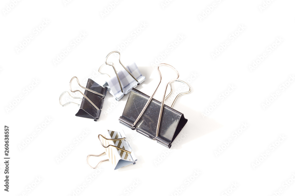 Four different office clips on a white background to the left Four different office clips on a white background to the left