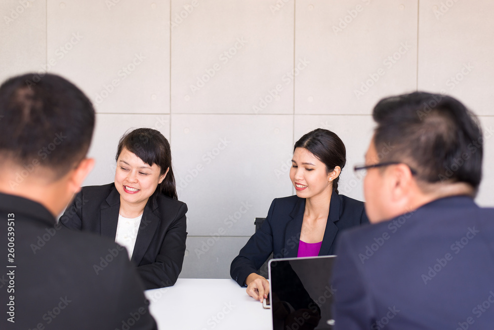 Group of business asian people meeting and working communicating while sitting at room office desk together,Teamwork Concept Group of business asian people meeting and working communicating while sitting at room office desk together,Teamwork Concept