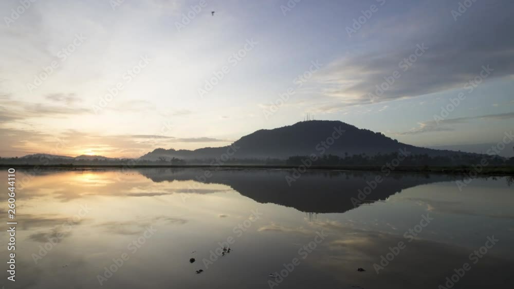 Timelapse reflection of sunrise dawn at Bukit Mertajam Hill. Timelapse reflection of sunrise dawn at Bukit Mertajam Hill.